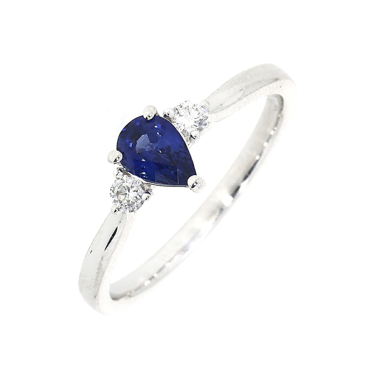 18ct White Gold Pear Shaped Sapphire and Round Diamond 3 Stone Ring