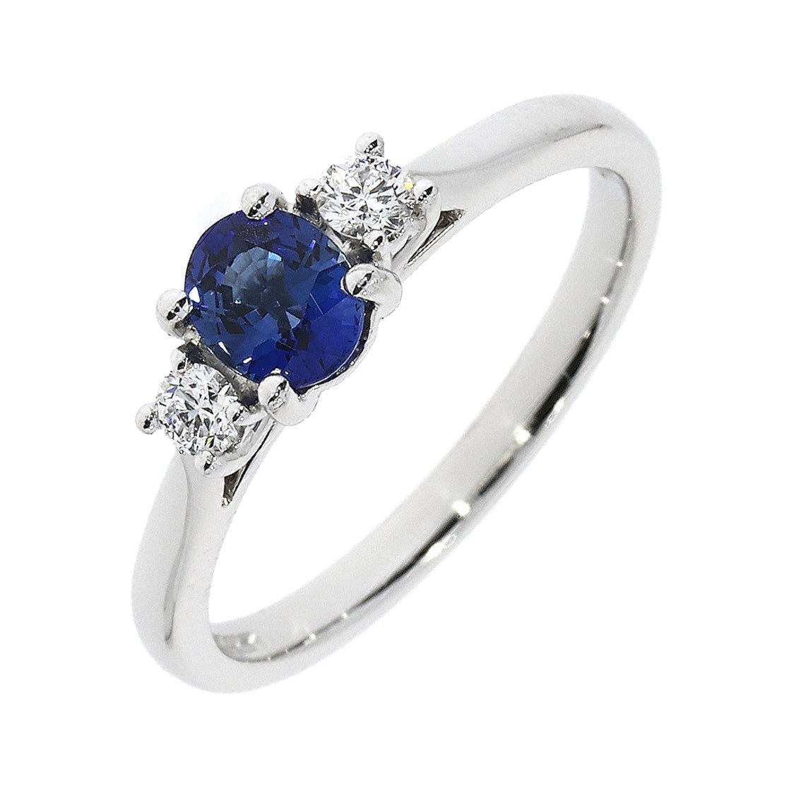 Platinum Oval Sapphire and Round Diamond 3 Stone Ring