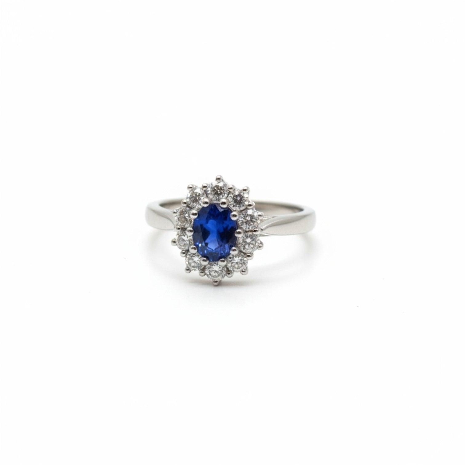 Platinum Oval Sapphire and Diamond Cluster Ring