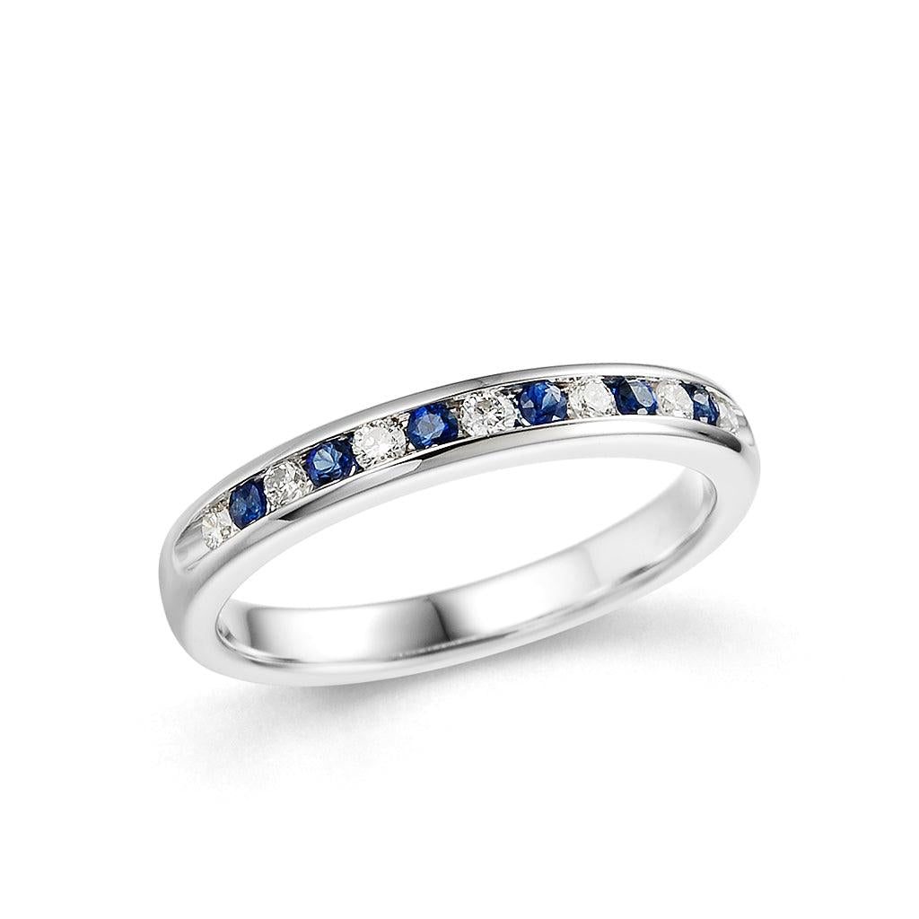 Platinum 7 diamond and 6 sapphire channel set eternity ring