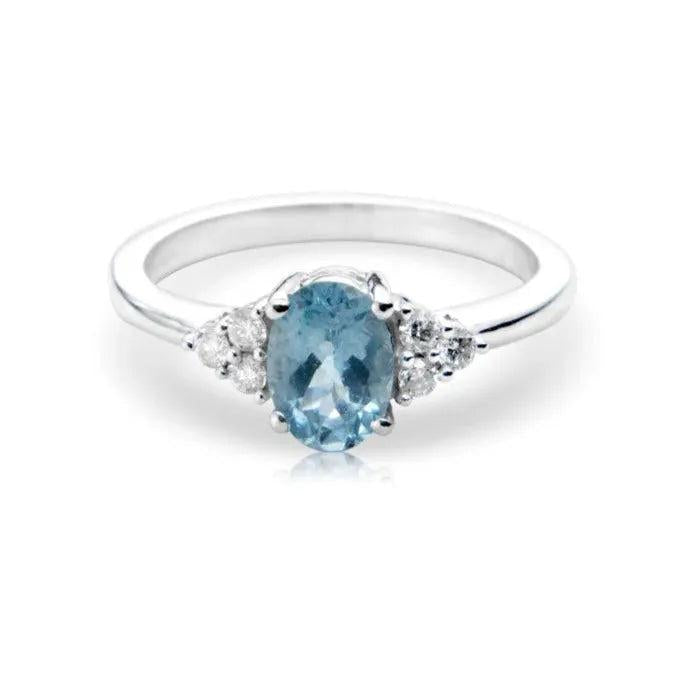 18ct White Gold ovl aqua & b/c dia tref clw set ring
