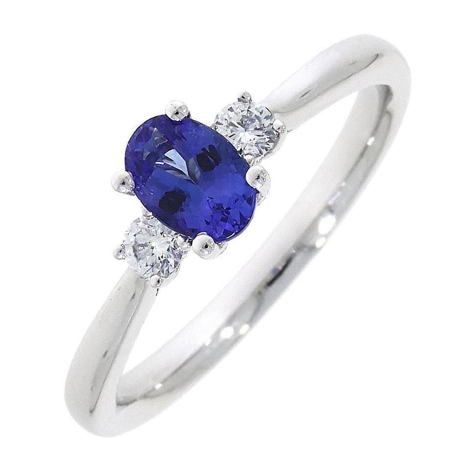 Platinum Sapphire and Diamond Claw set three stone ring