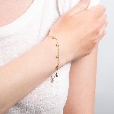 Gold Plated Four Claw Set Zirconia Station Bracelet