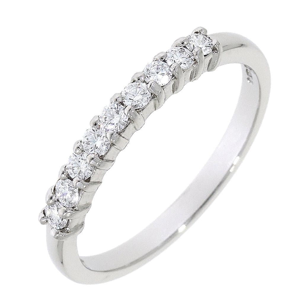 Platinum claw set 9-stone Diamond half eternity style ring
