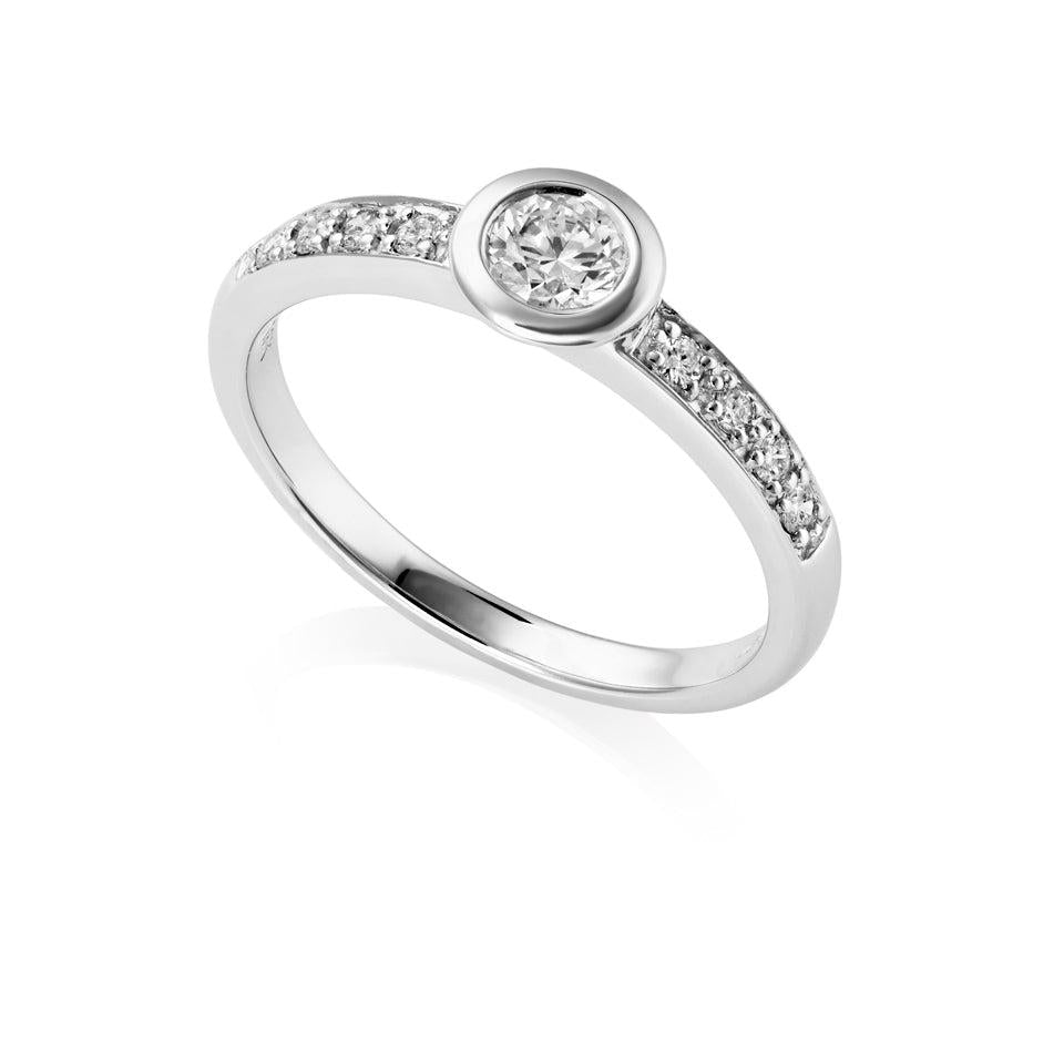18ct White Gold Rubover Set Round Brilliant Cut Solitaire Ring with Diamond Shoulders