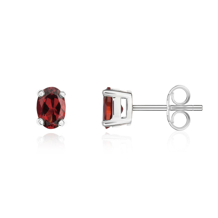 Dipples-9ct white gold 6x4mm oval garnet claw set stud earrings-Dipples Jewellers