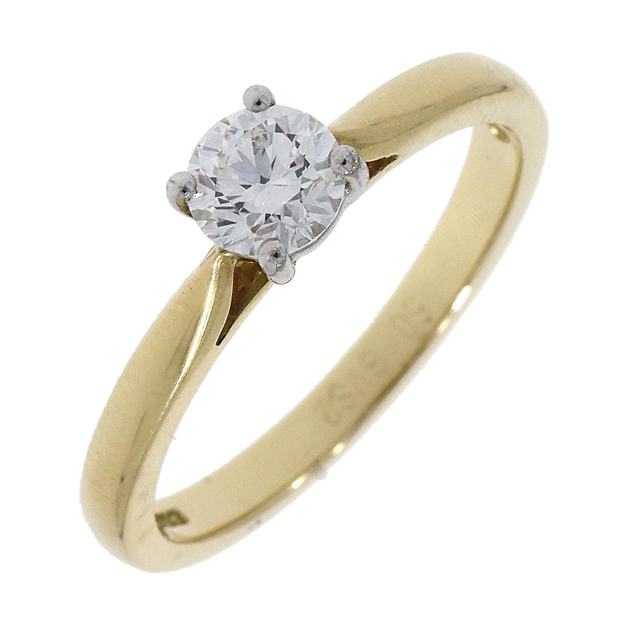 18ct Gold yellow and white gold 4 claw solitaire diamond ring