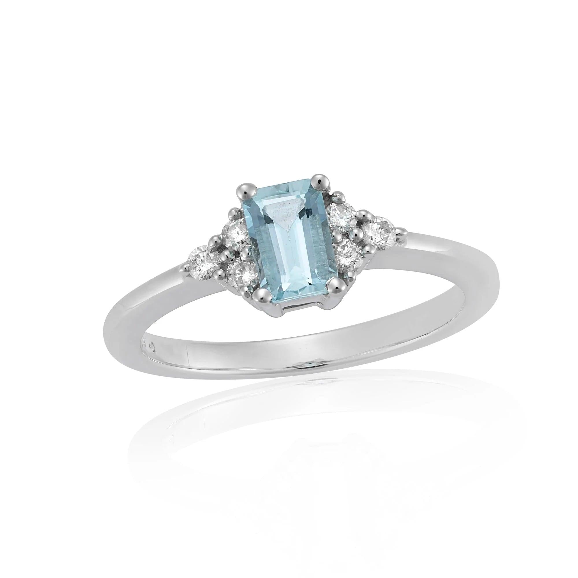 18ct White Gold 6x4 oct aqua + dia tref clw set rng