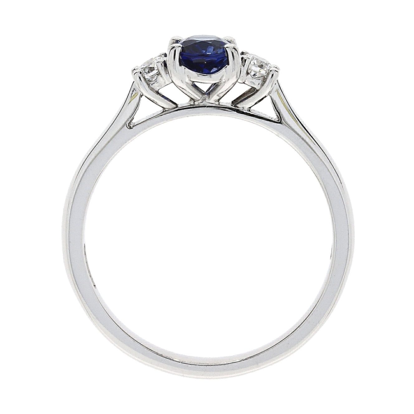 18ct white gold claw set oval cut Sapphire and 2 brilliant cut Diamond ring