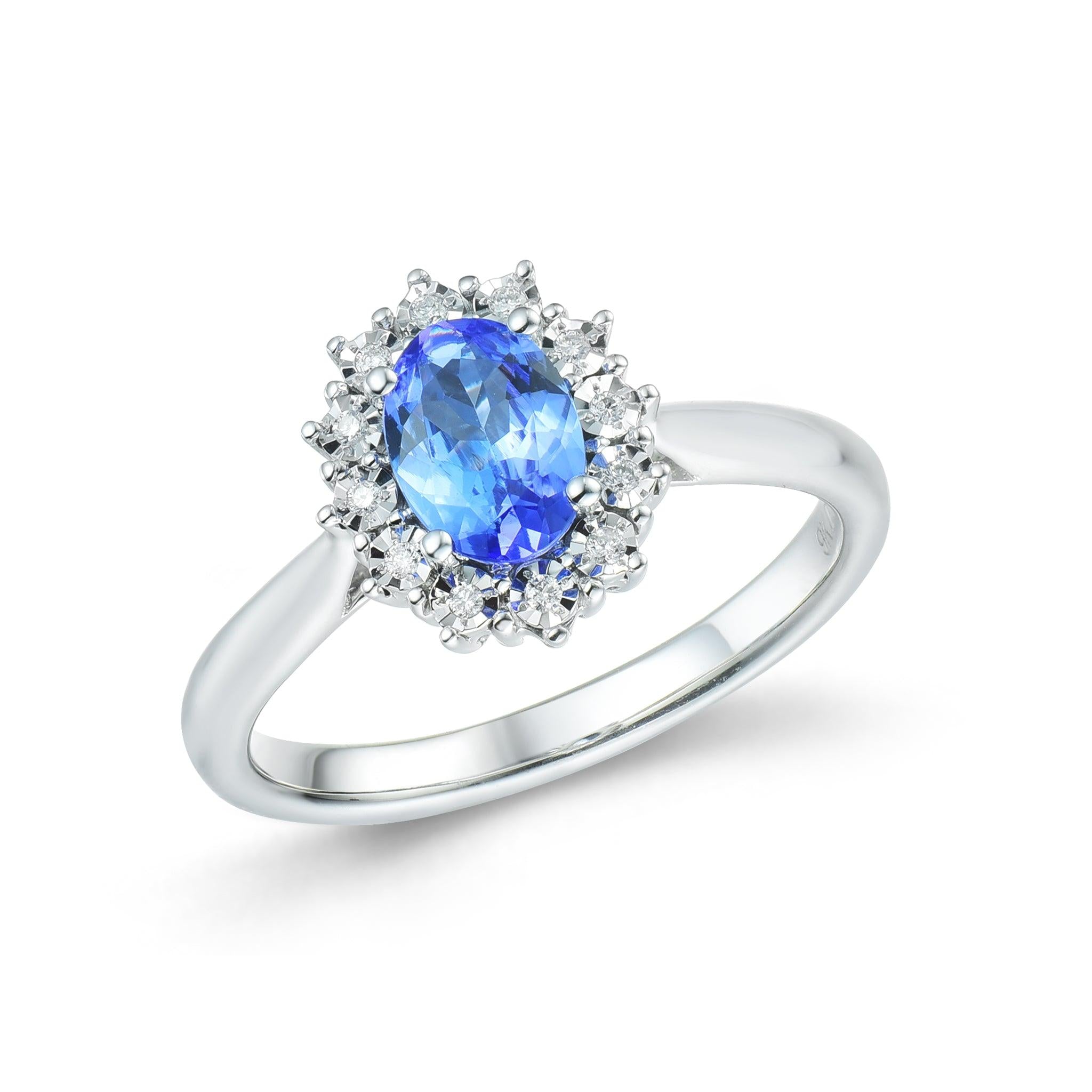 9ct white gold Tanzanite and illusion set Diamond oval cluster ring