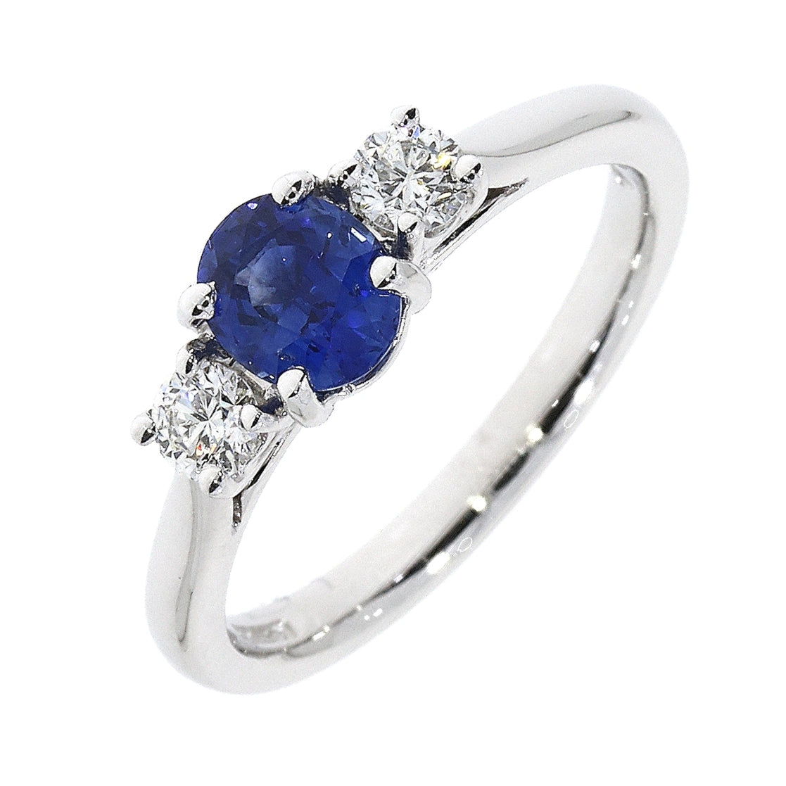 Platinum Oval Sapphire and Round Diamond 3 Stone Ring