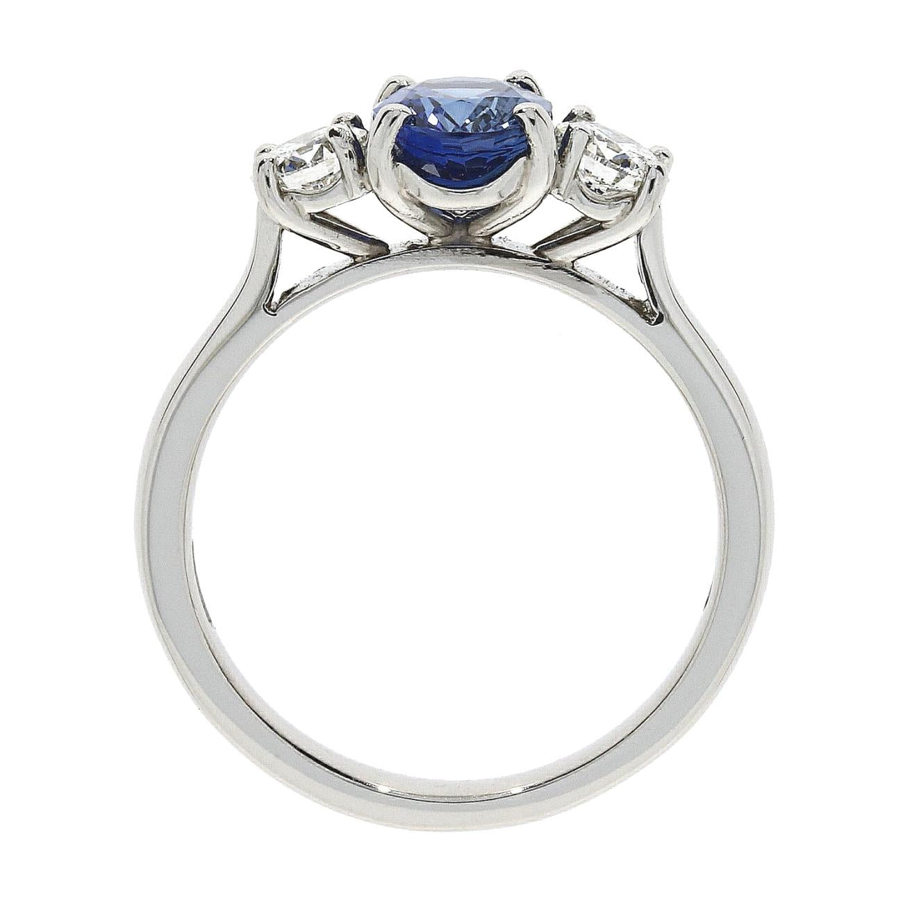 Platinum Oval Sapphire and 2 Round Brilliant Diamond 3 Stone Ring