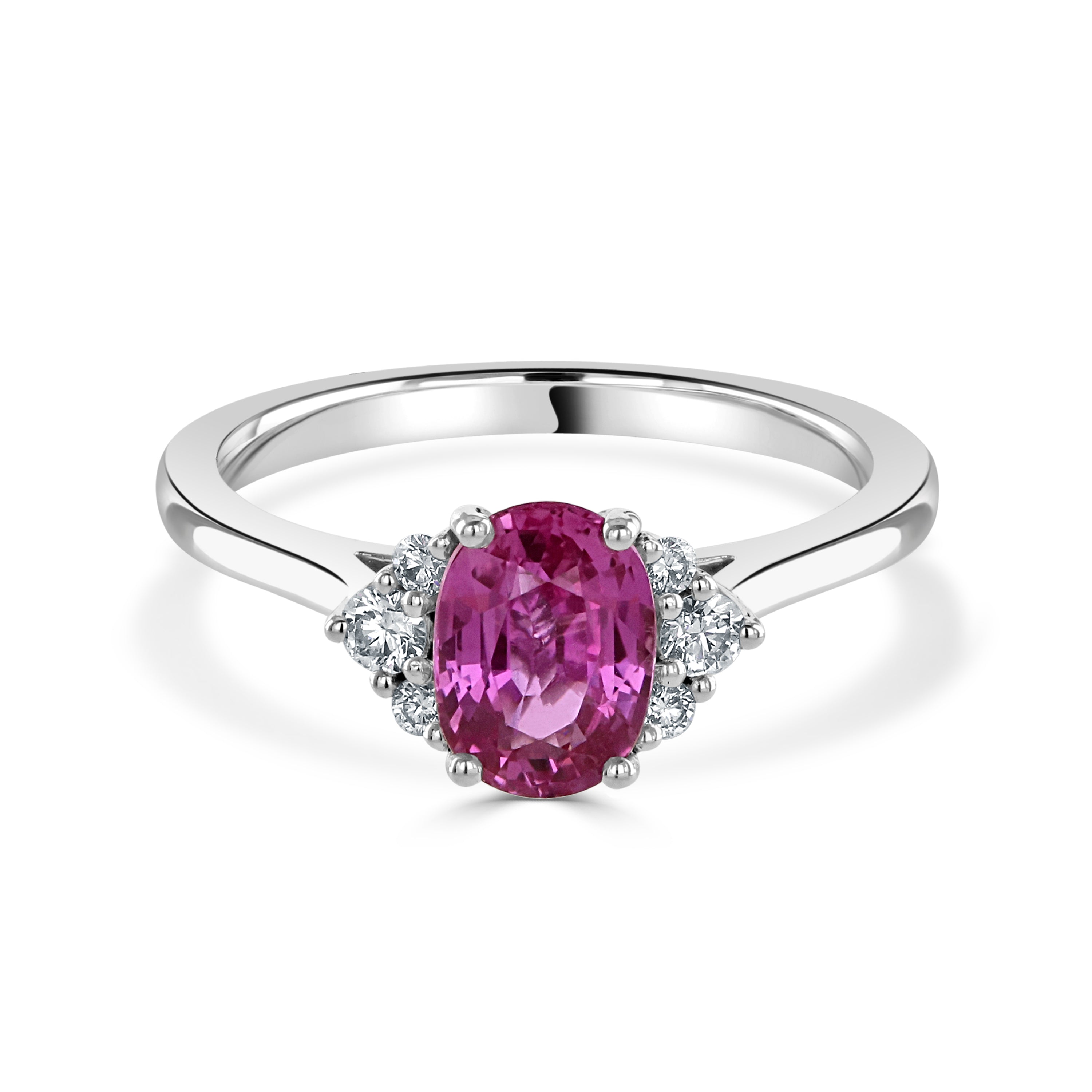 18ct white gold oval pink sapphire and diamond trefoil sides ring all claw set