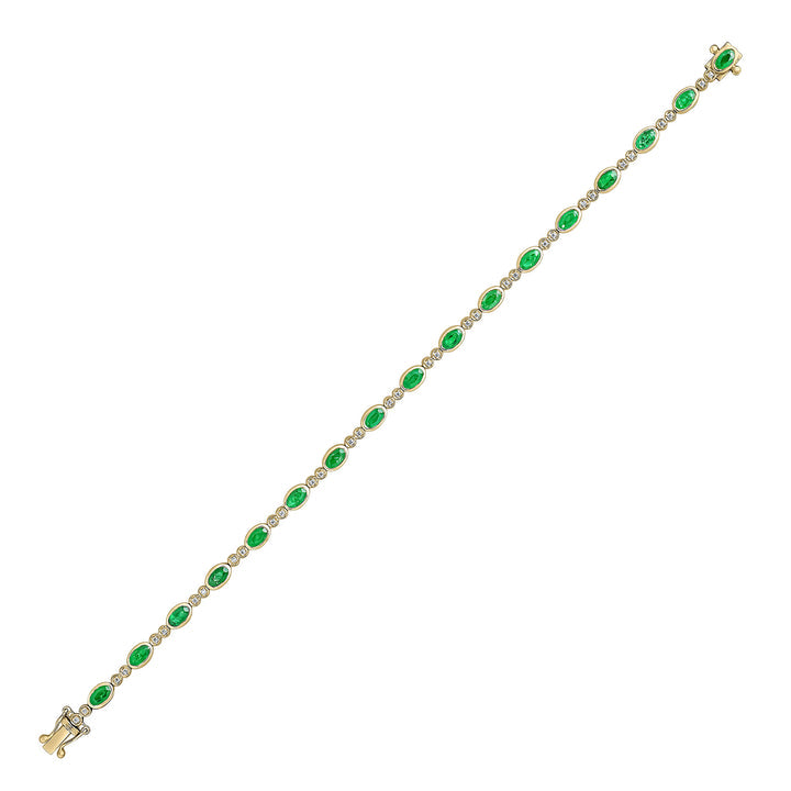 18ct Gold yellow and white gold oval emerald and brilliant cut diamond bracelet