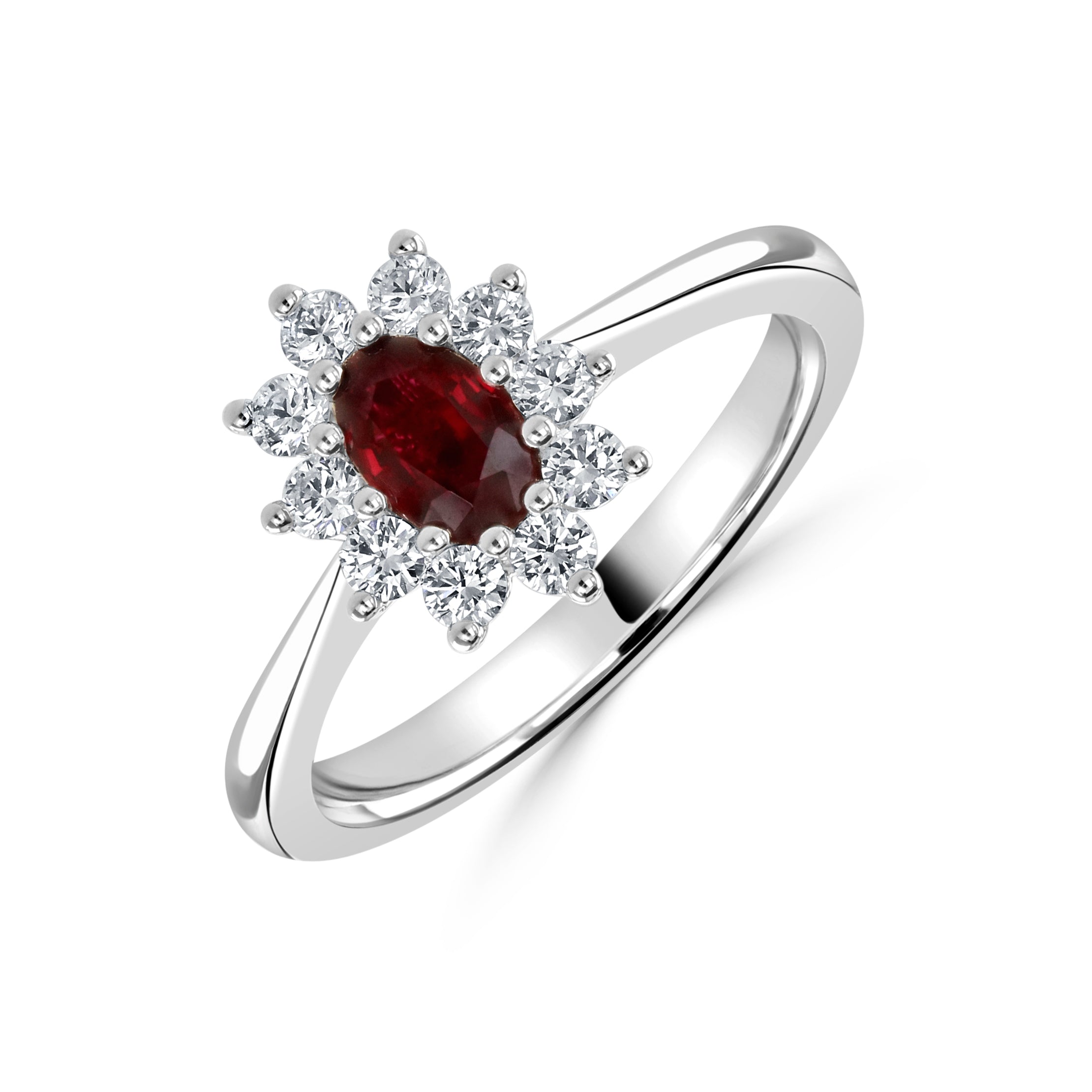 Platinum oval ruby and diamond cluster claw set ring