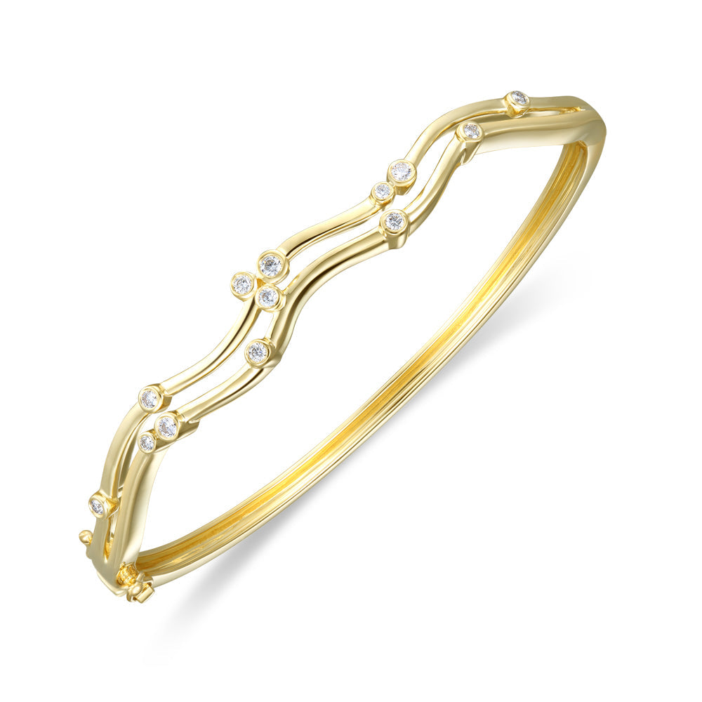 18ct yellow gold rubover set round brilliant cut Diamond bubble wave bangle