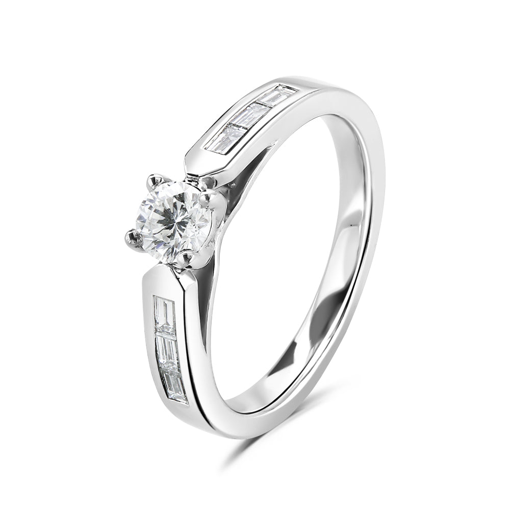 Platinum brilliant cut diamond ring with diamond set shoulders