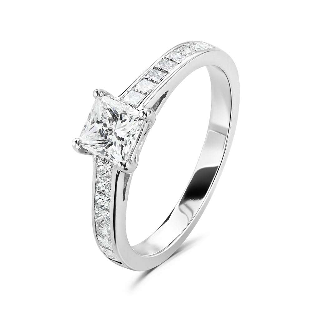 Platinum 4 claw set princess cut Diamond solitaire ring with princess cut Diamond shoulders