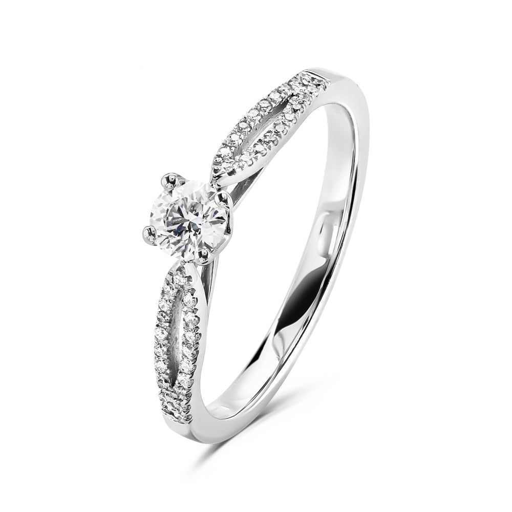Platinum 4 claw set round brilliant cut Diamond solitaire ring with split claw set Diamond shoulders