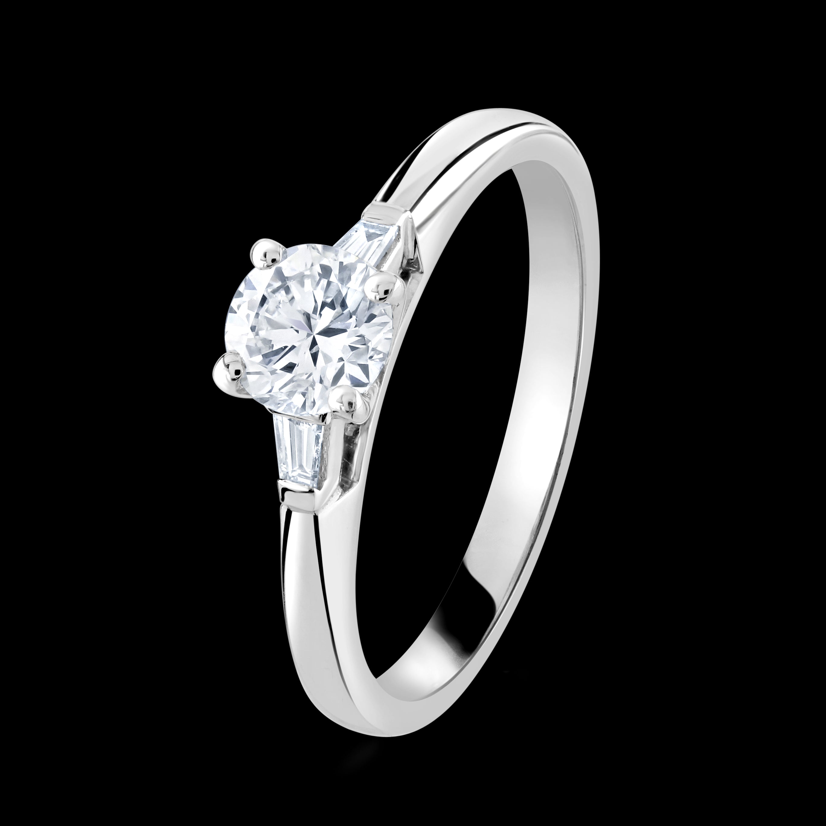 Platinum 4-claw set round brilliant cut Diamond solitaire ring with two tapered Diamonds