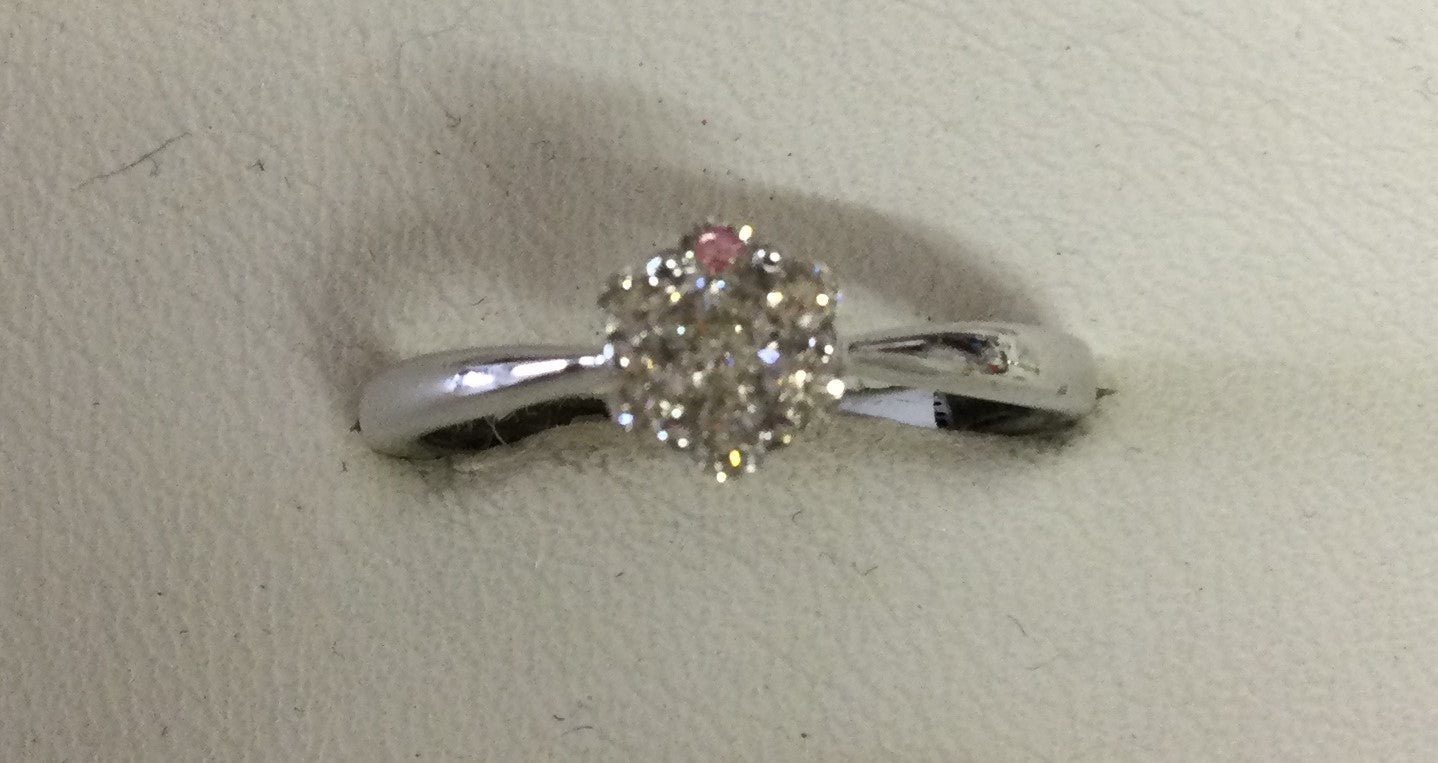 9ct White Gold 7dia-Clust Claw Set
