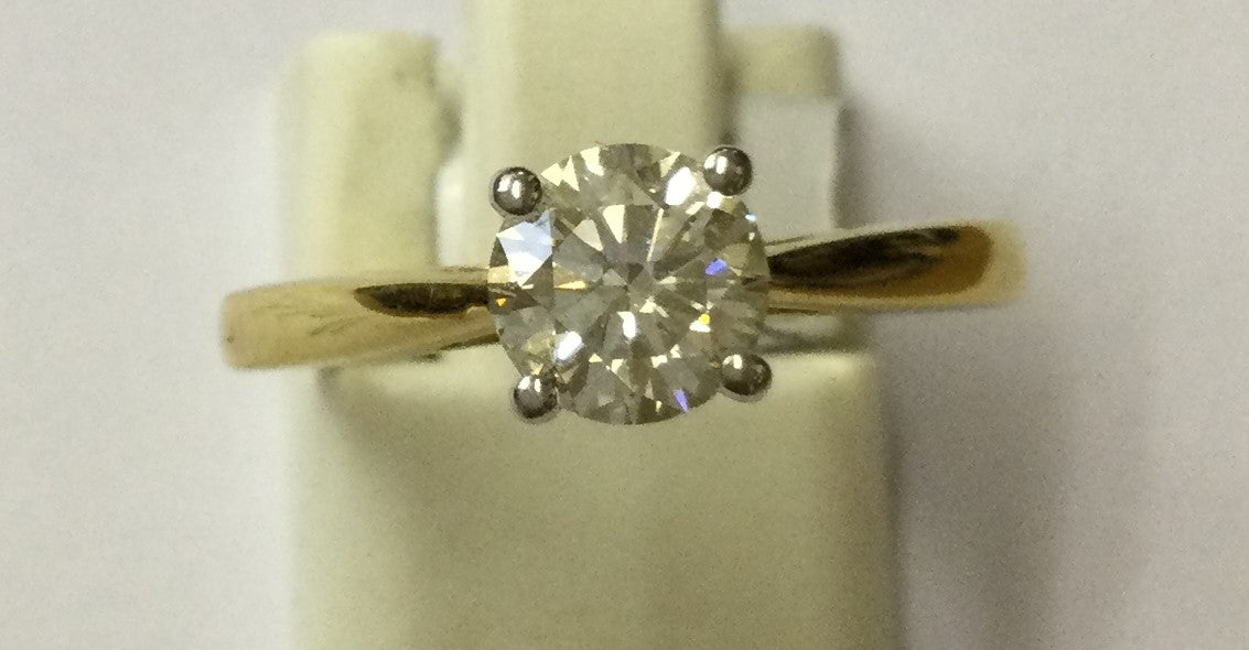 18ct Gold yellow gold claw set round brilliant cut solitaire Diamond ring
