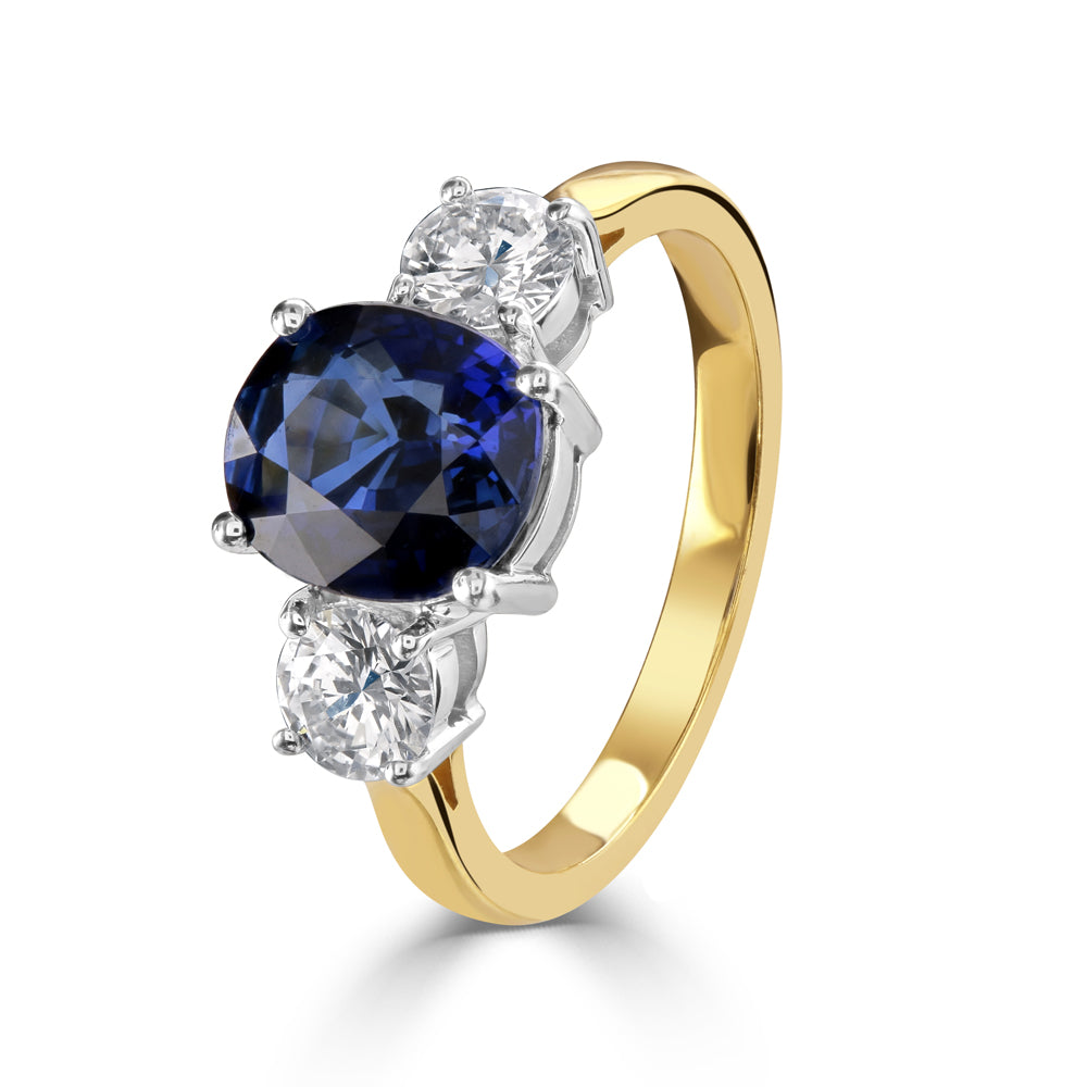 18ct Yellow Gold Oval Cut Sapphire & Round Brilliant Cut Diamond Trilogy Ring