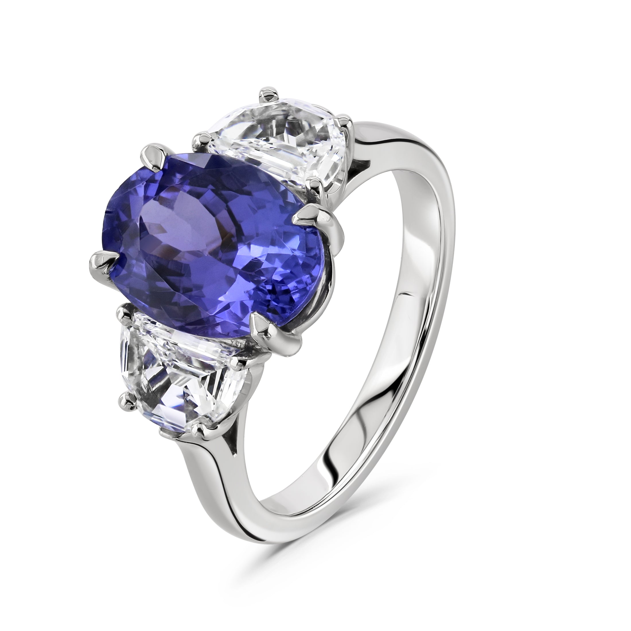 Platinum Oval Cut Tanzanite & Diamond Trilogy Ring