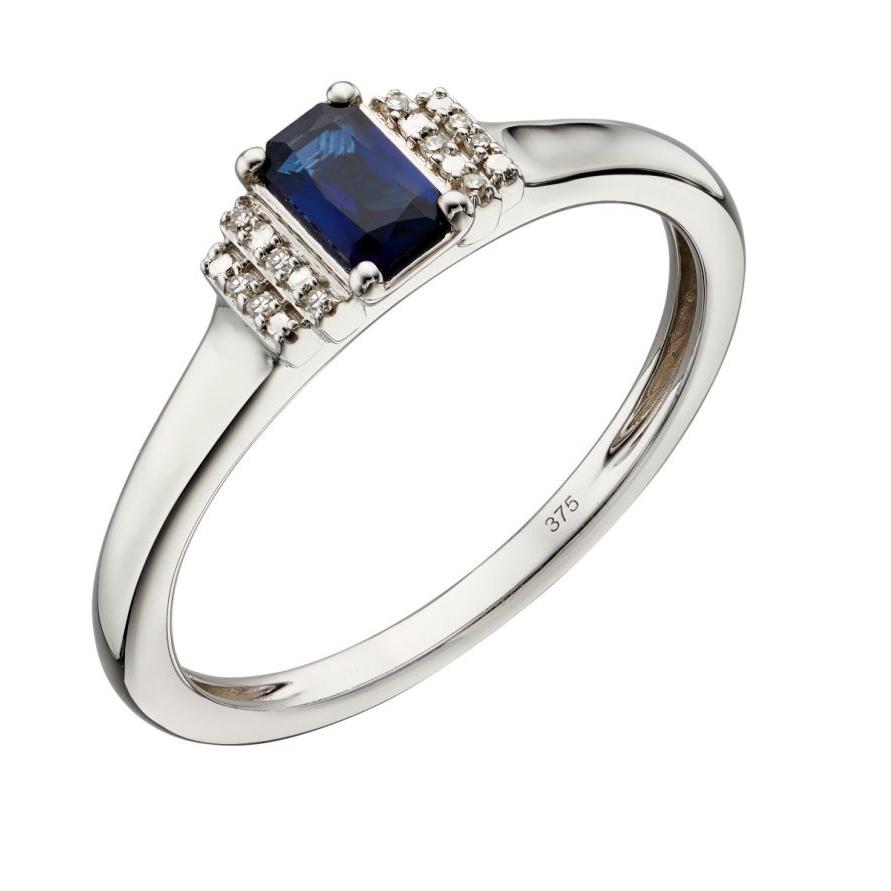 9ct White Gold Emerald Cut Sapphire & Stepped Diamond Shoulders Ring