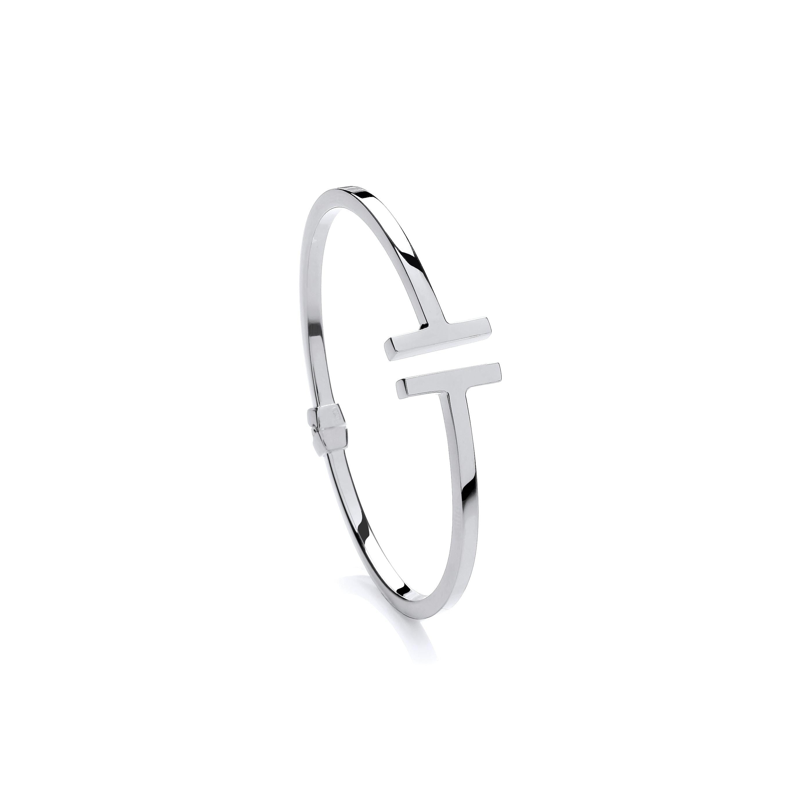 Silver T torque hollow hinged bangle