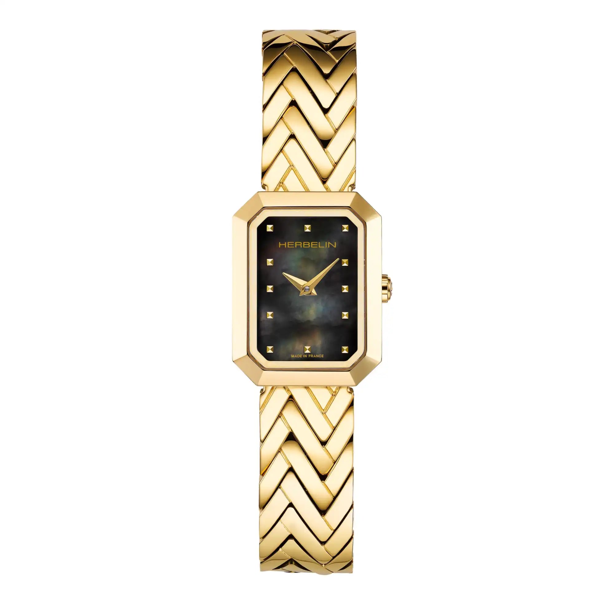 files/gold-toned-wristwatch-black-rectangular-face-chevron-patterned-band.webp