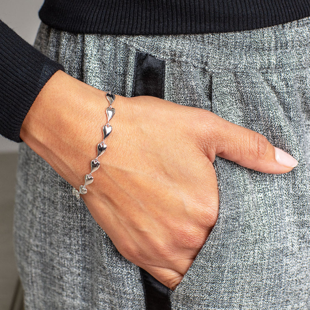 Kit Heath-Silver Desire Kiss Rhodium Plate Linking Hearts Bracelet-Dipples Jewellers