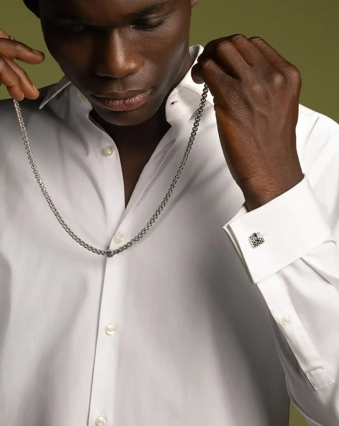 files/silver-chain-necklace-worn-crisp-white-dress-shirt.webp
